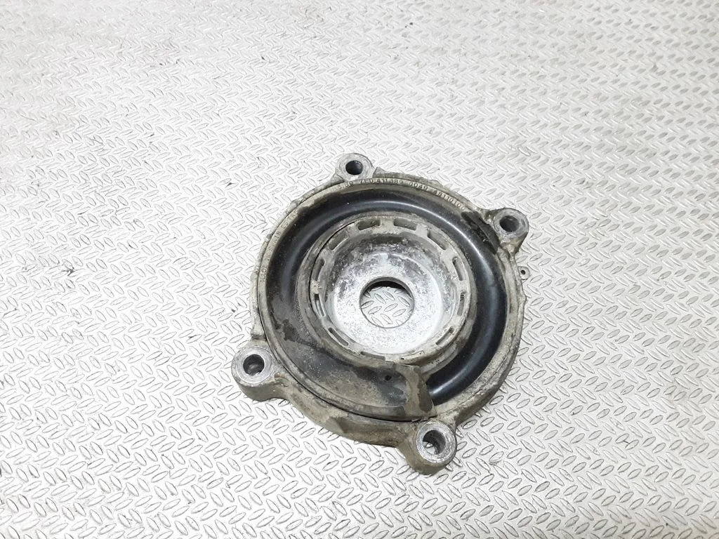 Front coil spring rubber mount 7L0411189