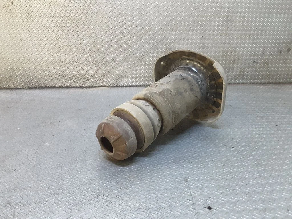 Rear coil spring rubber mount