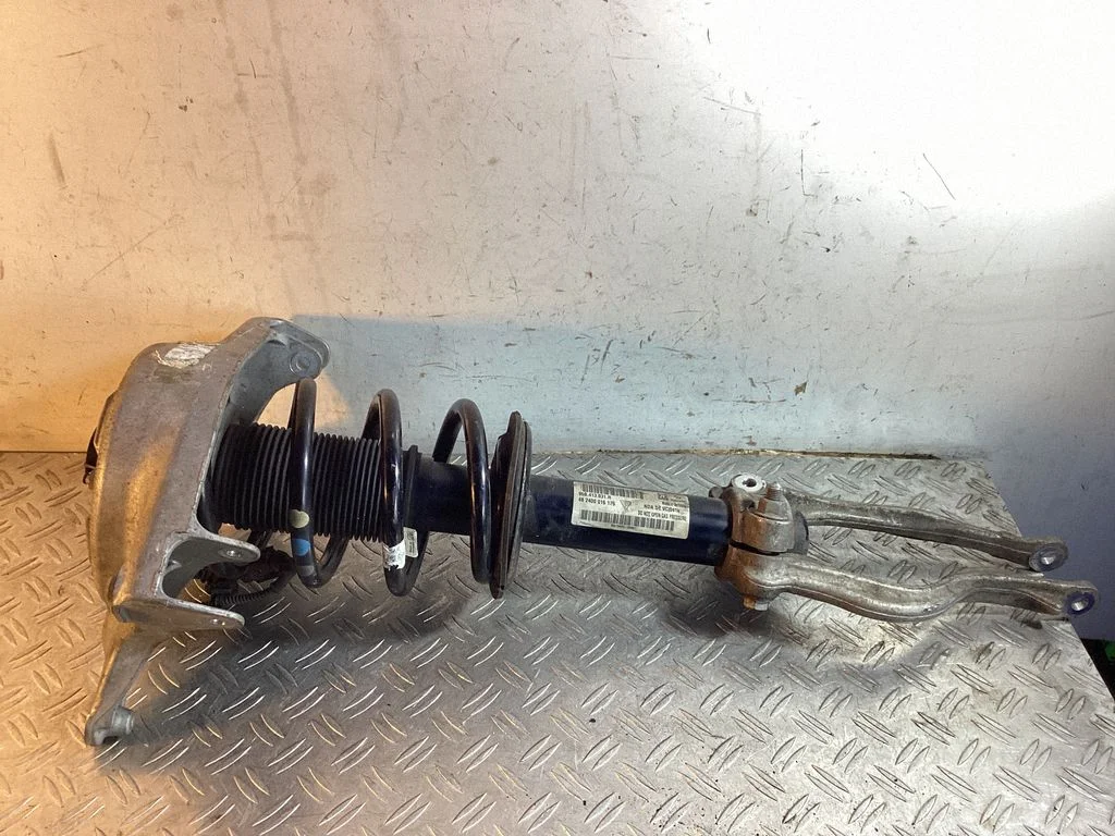 Front shock absorber with coil spring – Porsche Macan (95B) (2019-)