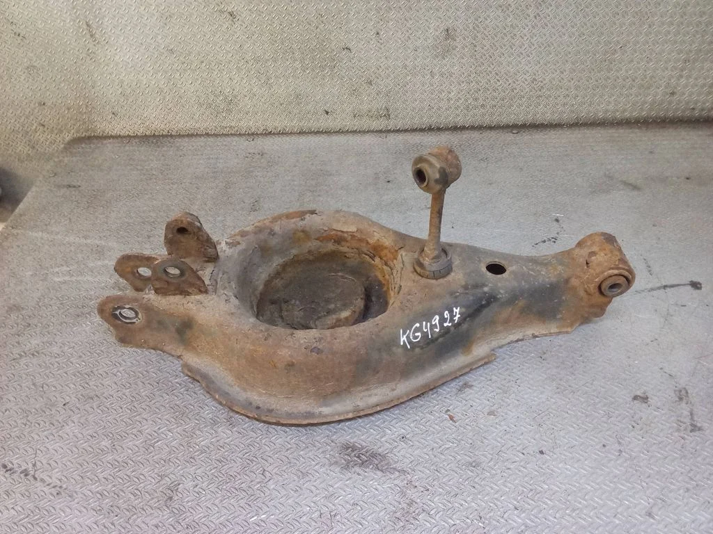 Rear upper control arm/wishbone – left