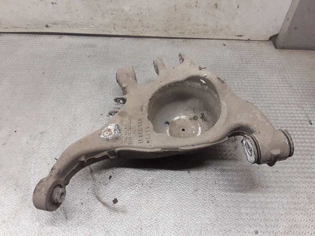 Rear upper control arm/wishbone – left