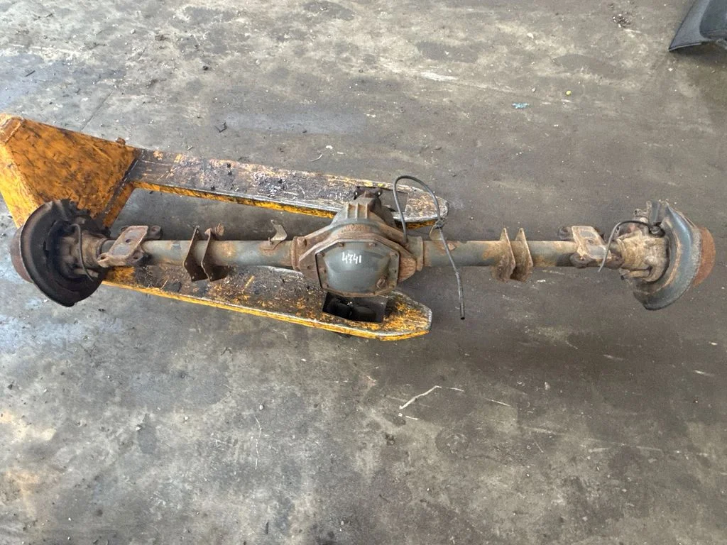 Rear axle beam with reductor