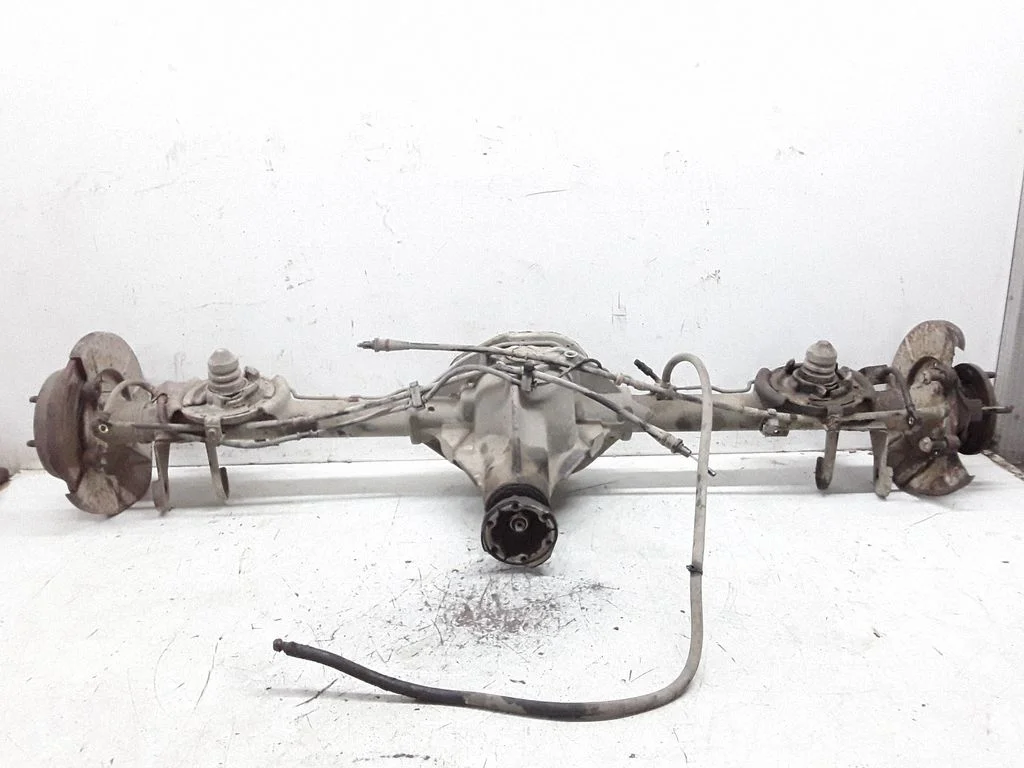 Rear axle beam with reductor
