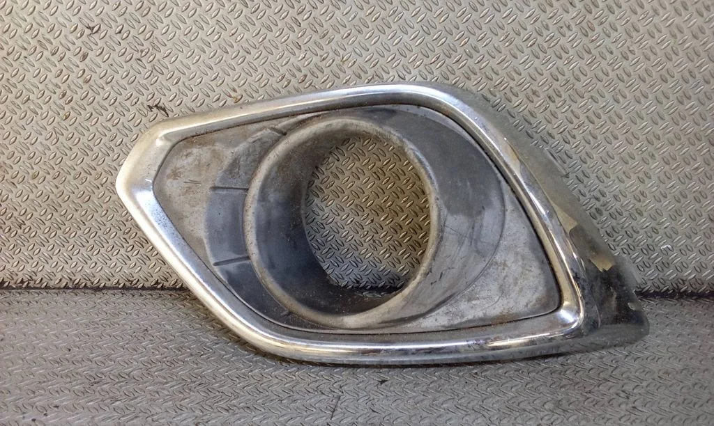 Front fog light trim/grill 25953664