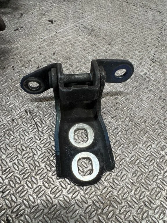 Front door upper hinge – left