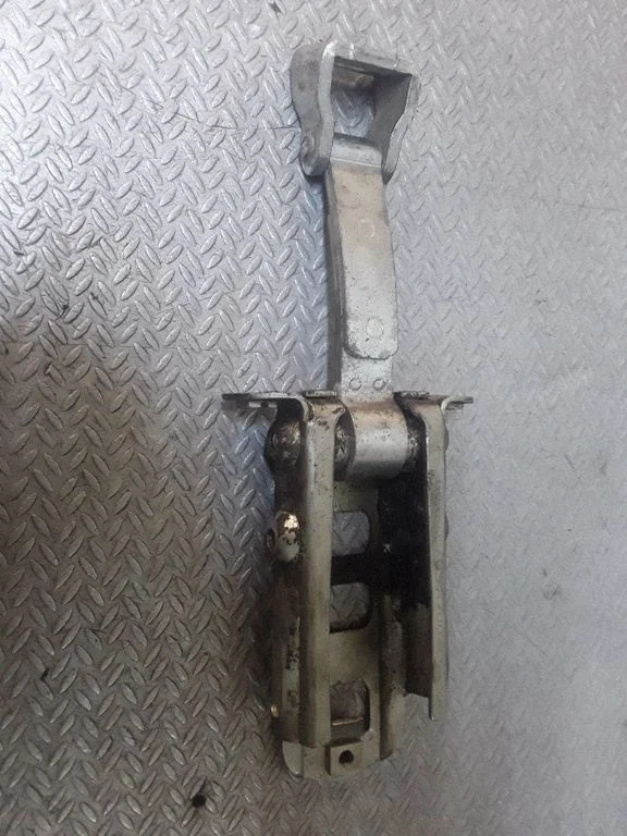 Front door check strap stopper – left