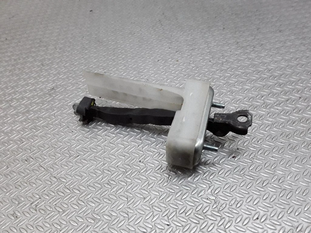 Front door check strap stopper – right