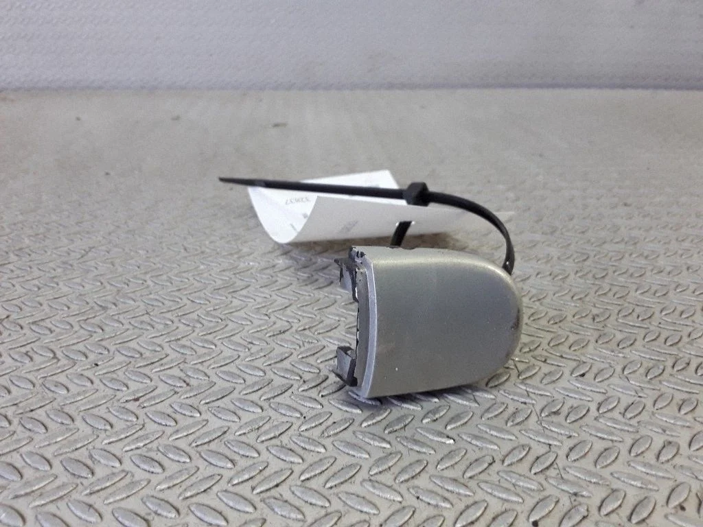 Rear door handle cover – left