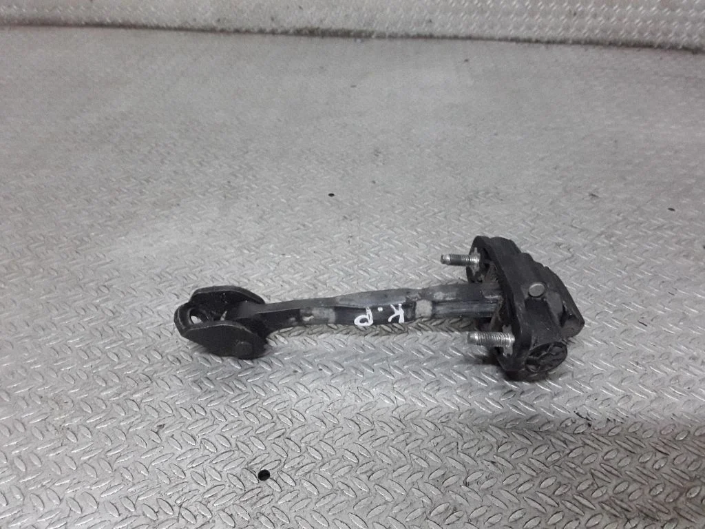 Front door check strap stopper – left