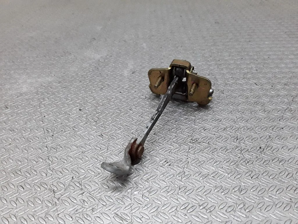 Front door check strap stopper 7700303548