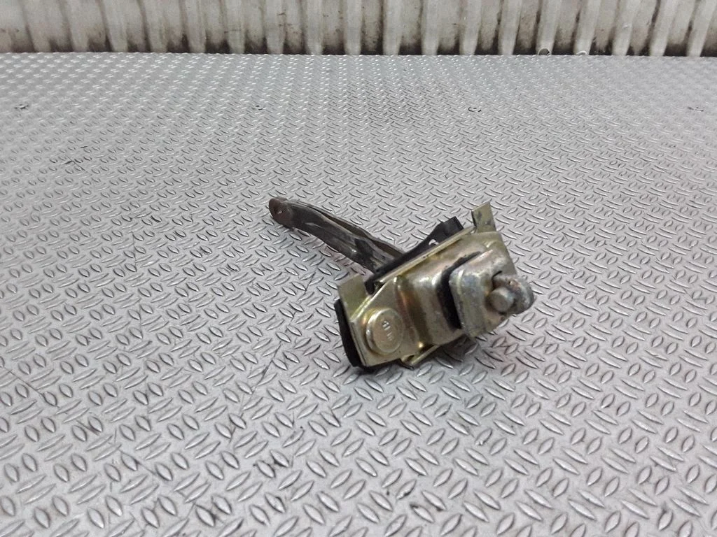 Front door check strap stopper – left