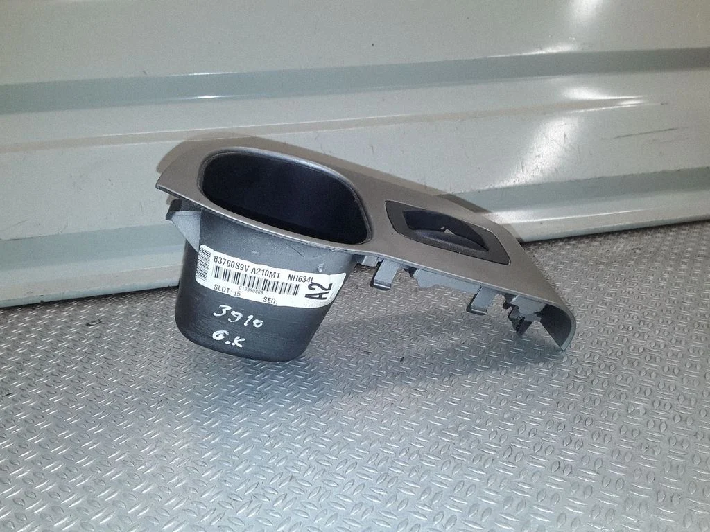 Rear door window switch trim – left