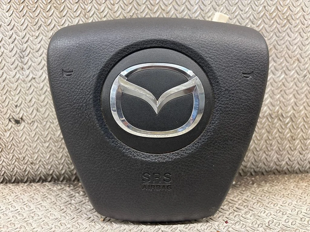 Steering wheel airbag T93402A