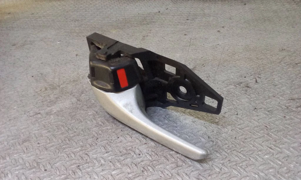 Rear door interior handle trim – rear left