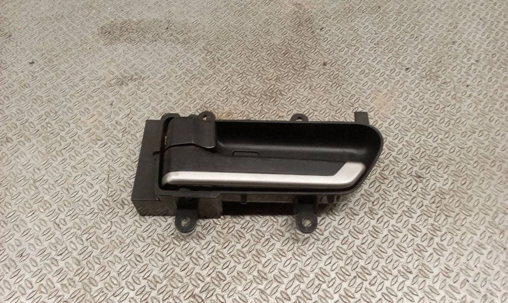 Rear door interior handle trim – left