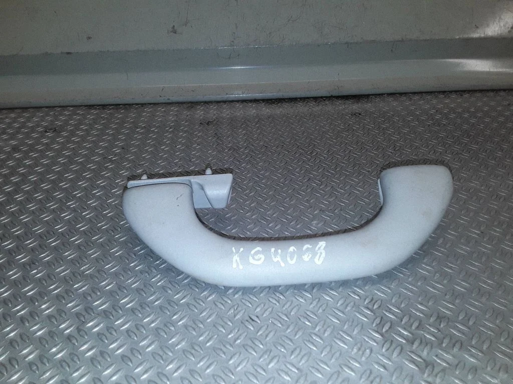 Rear interior roof grab handle – left