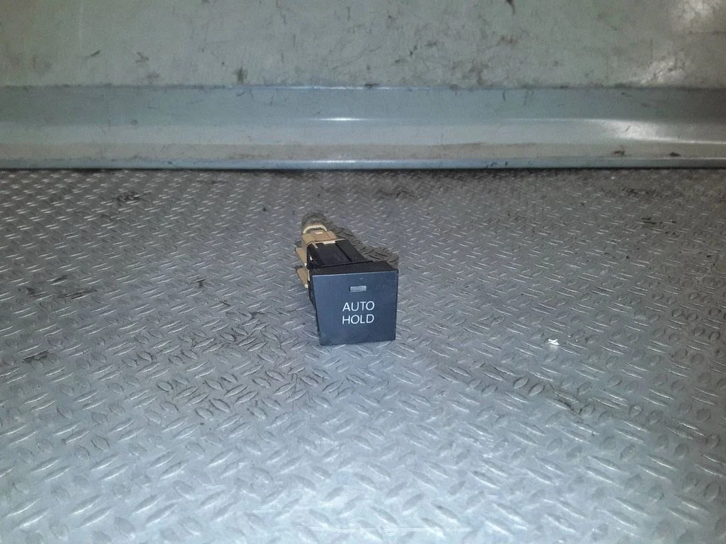 Handbrake/parking brake auto hold switch
