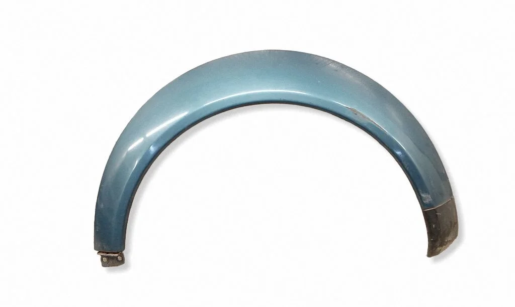 Rear arch trim – left