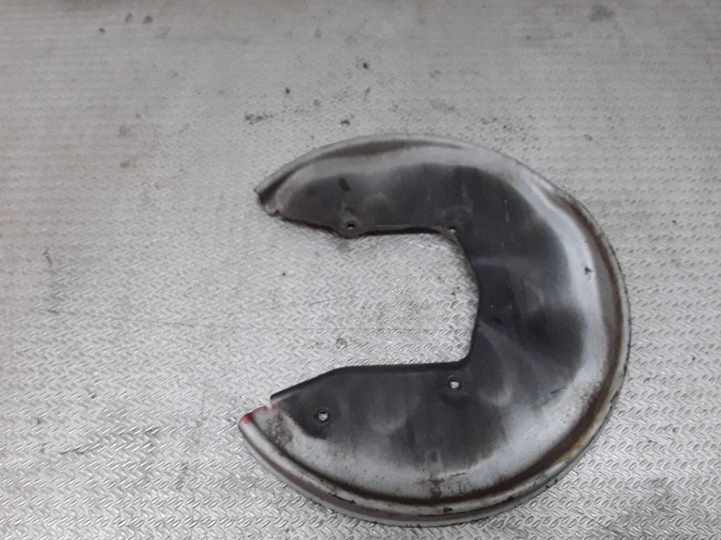 Rear brake disc plate dust cover – left