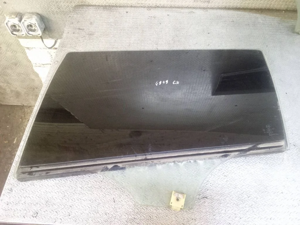 Rear door window glass – left