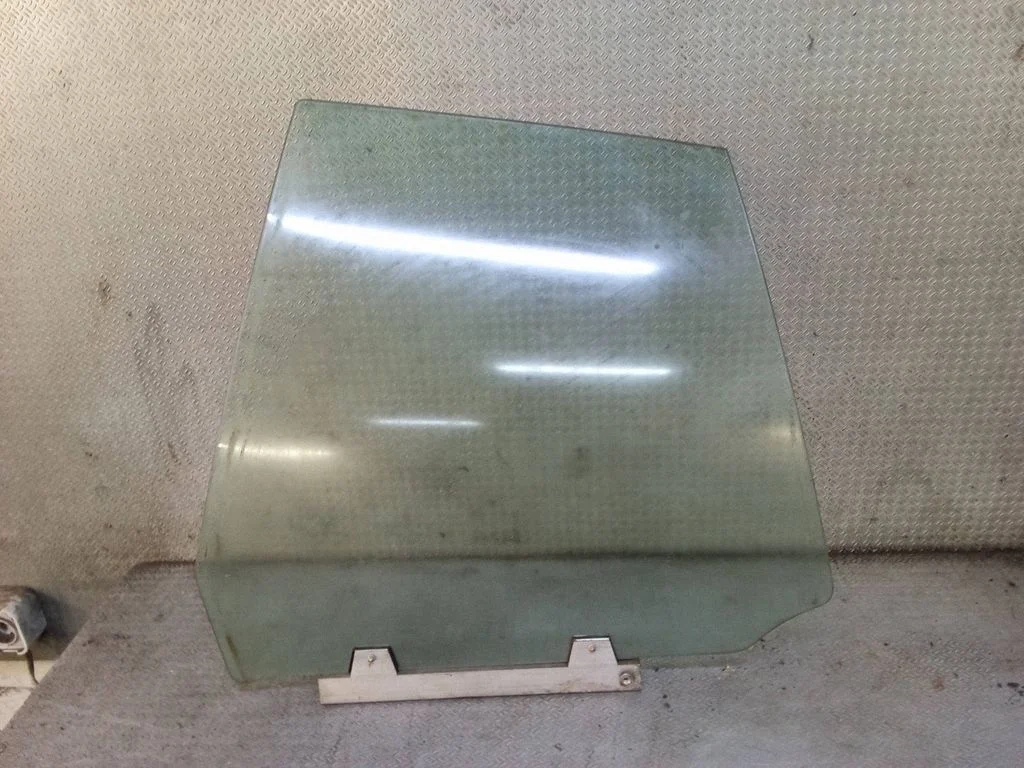 Rear door window glass – left