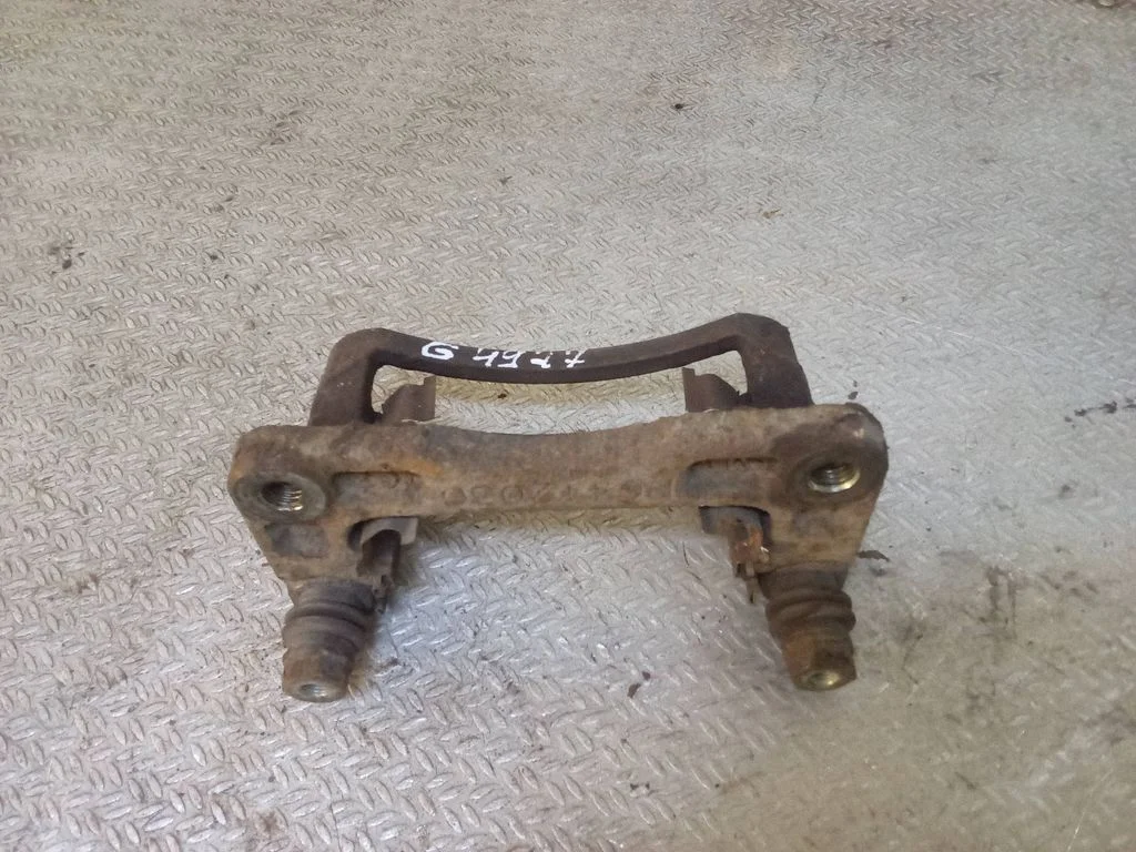 Brake caliper pad carrier rear