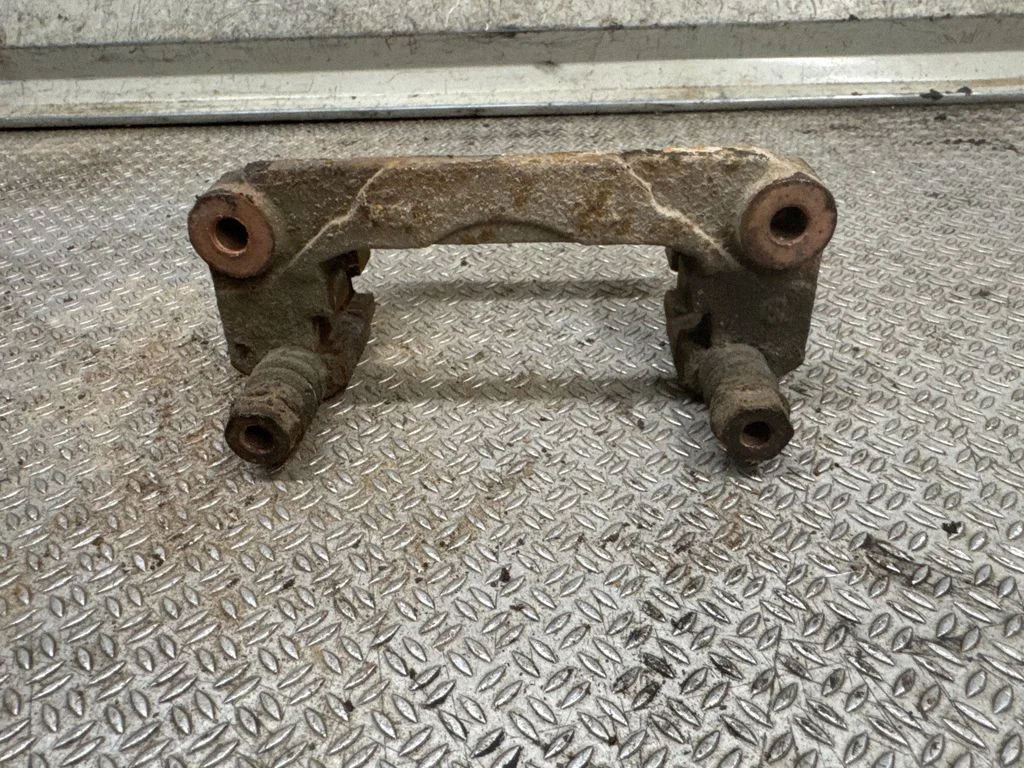Brake caliper pad carrier rear