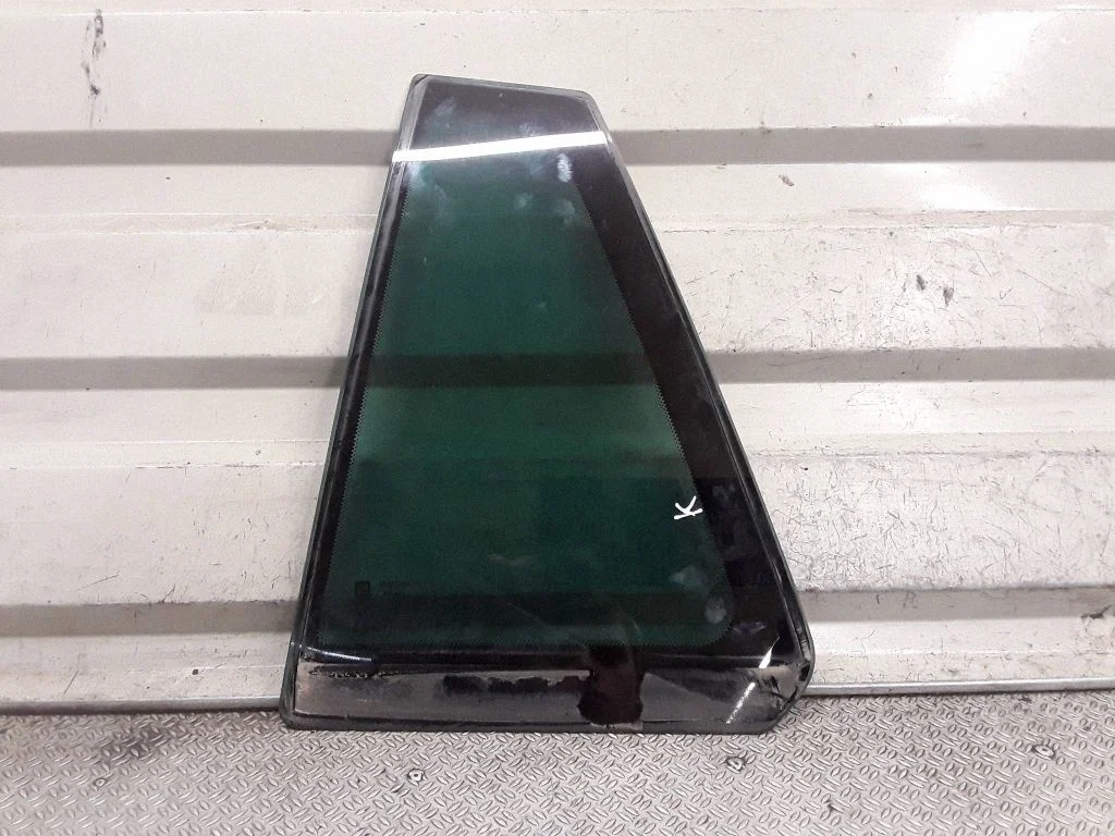 Rear vent window glass – left