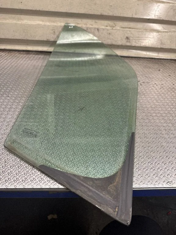 Front door vent window glass four-door – front left