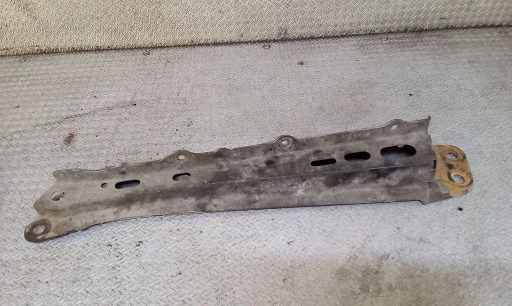Radiator support slam panel bracket