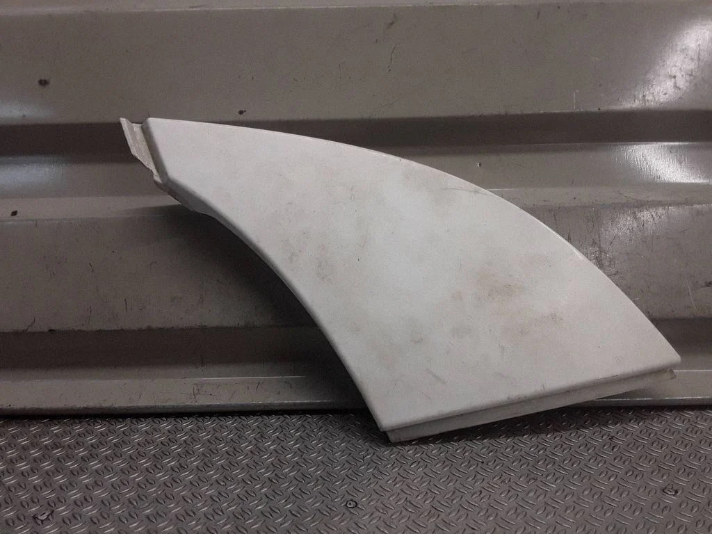 Under headlight/headlamp trim 1306531070