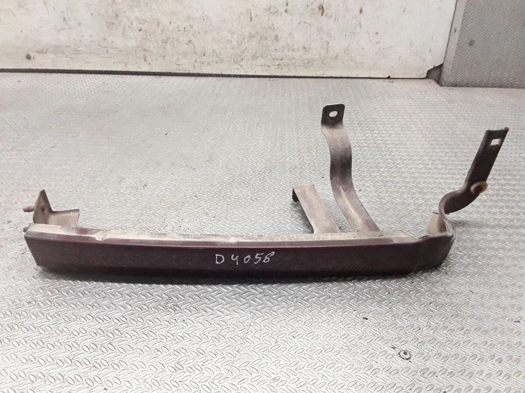 Under headlight/headlamp trim – right
