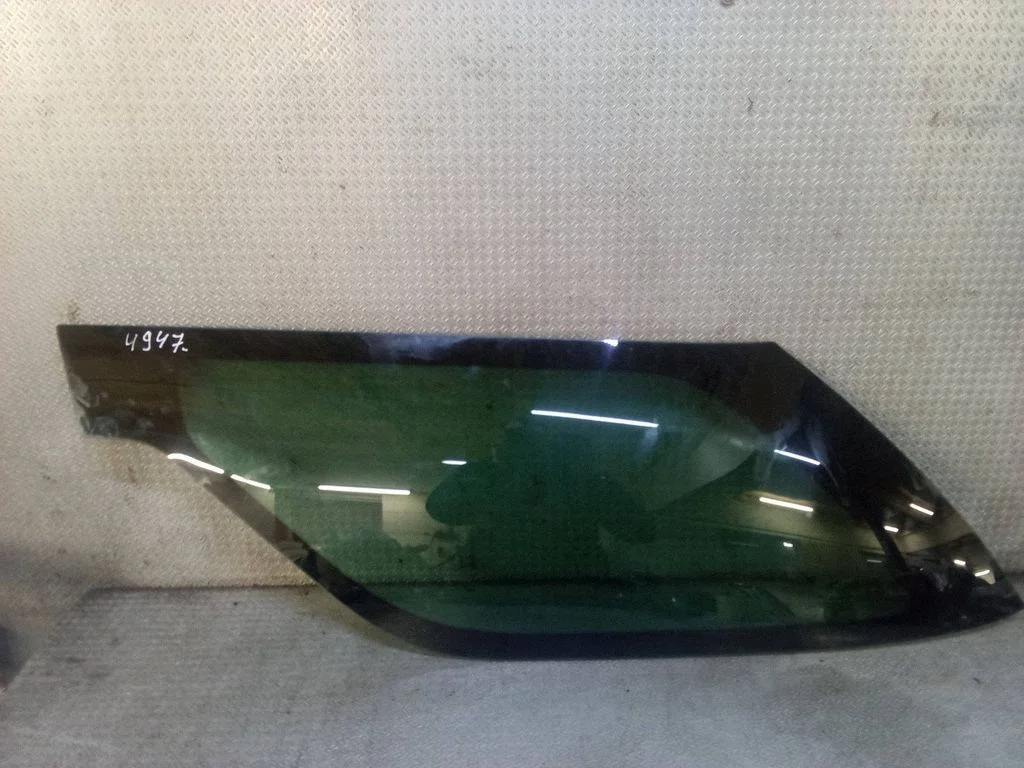 Rear side window – left