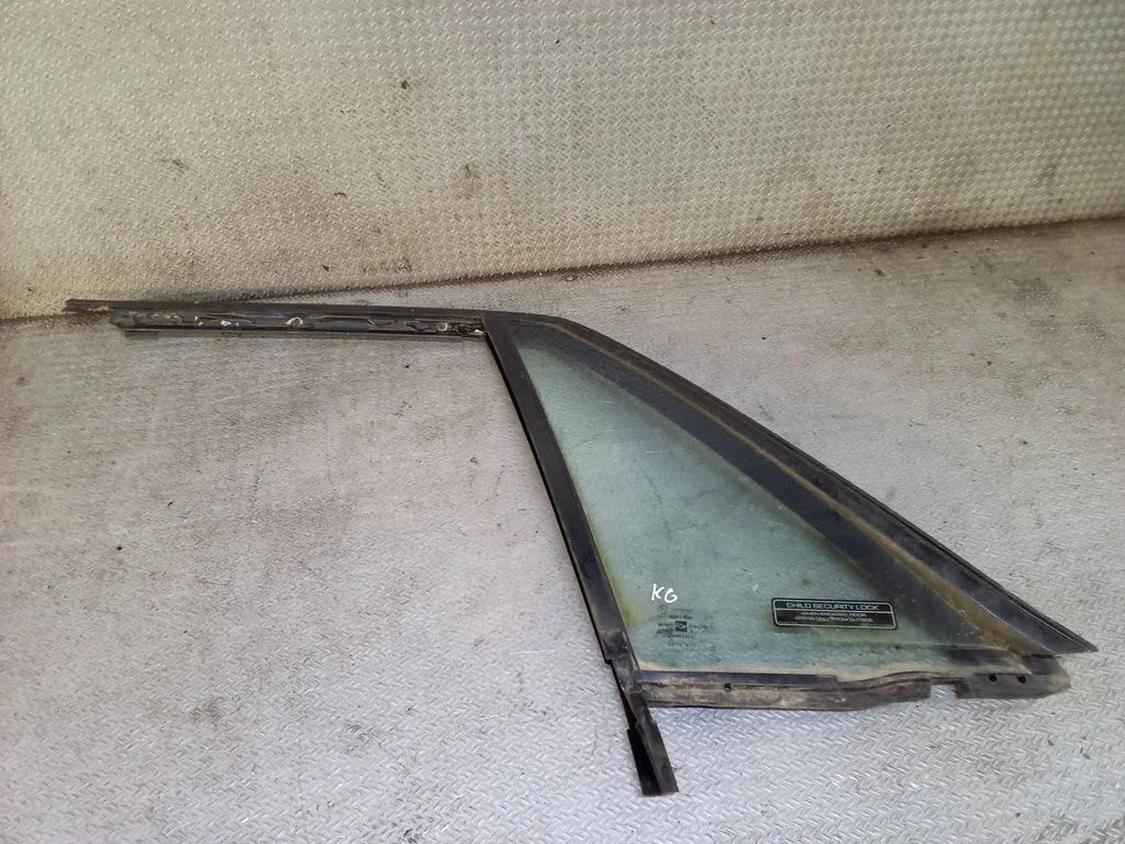 Rear side window – left