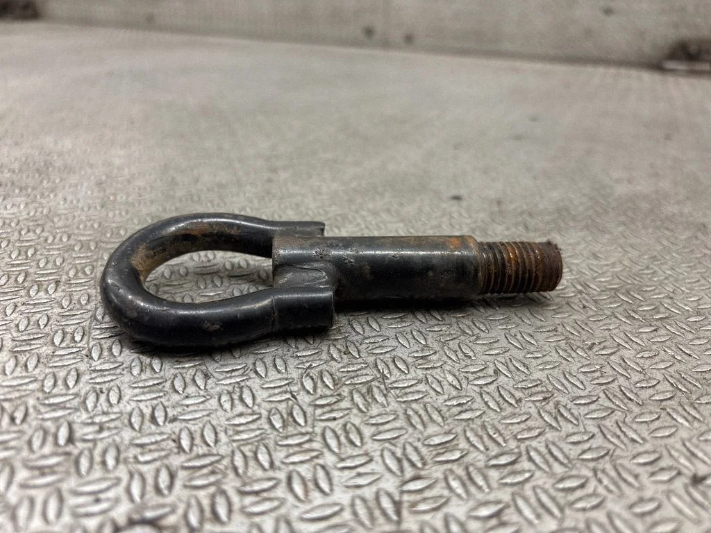 Towing hook eye