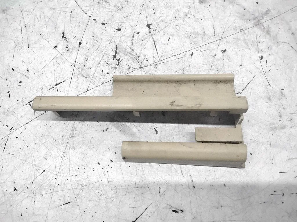 Front driver seat rail trim 7007695