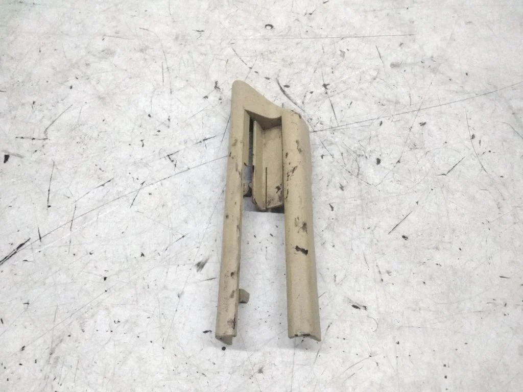 Front passenger seat rail trim – right