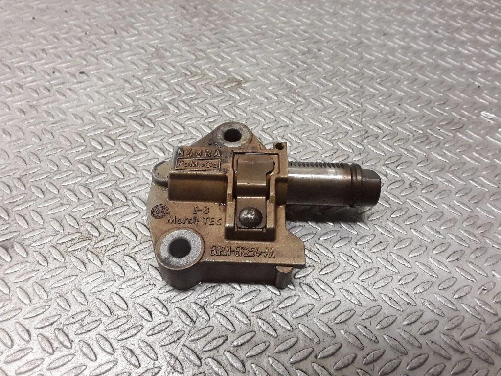 Timing belt/chain tensioner 6G9N6K254AA