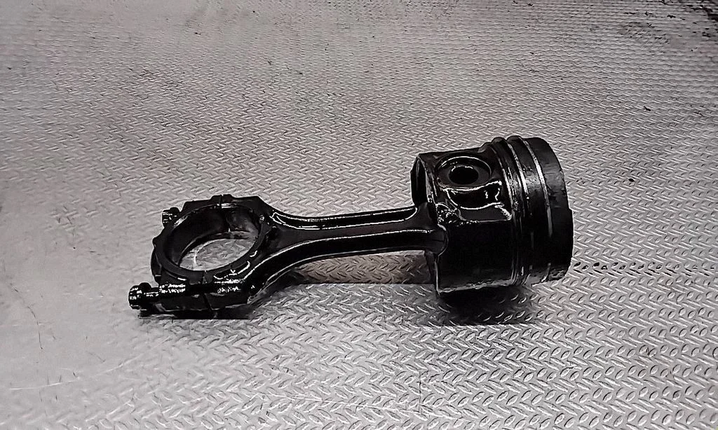 Piston with connecting rod