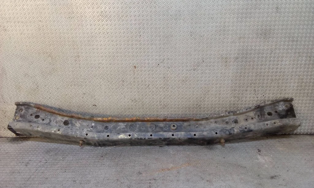 Bottom radiator support slam panel