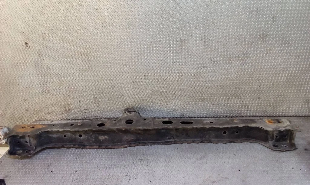 Bottom radiator support slam panel