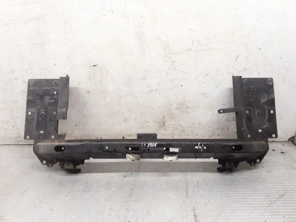 Bottom radiator support slam panel