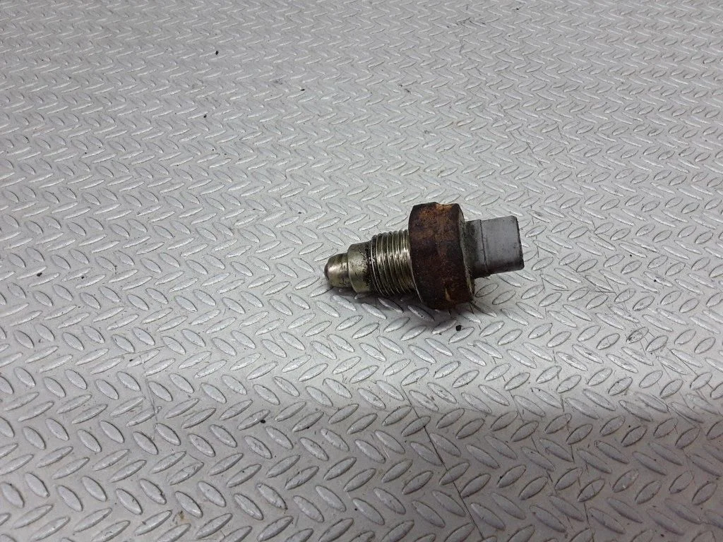 Reversing light switch sensor