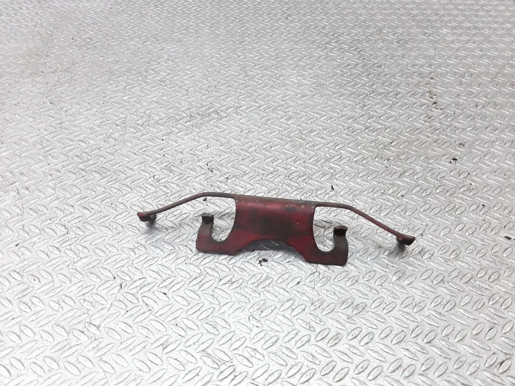 Front brake pad spring