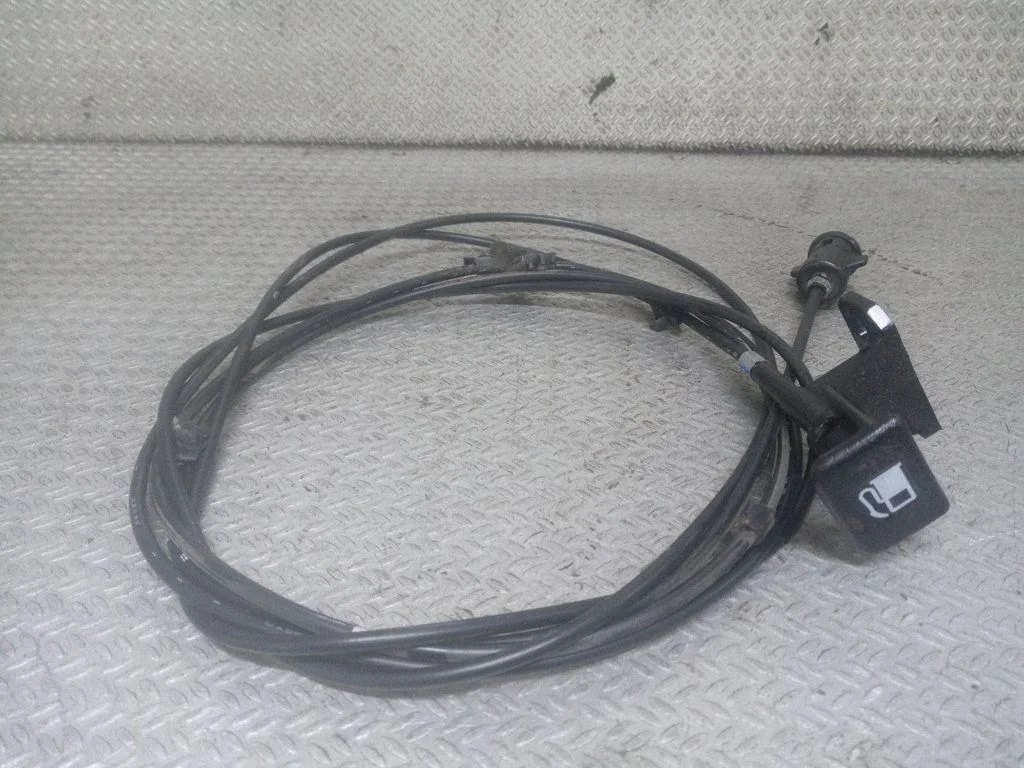 Fuel cap flap release cable