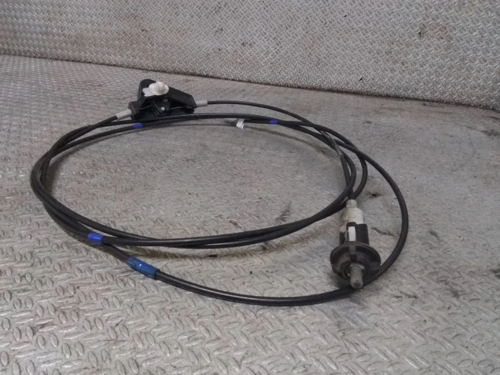 Fuel cap flap release cable