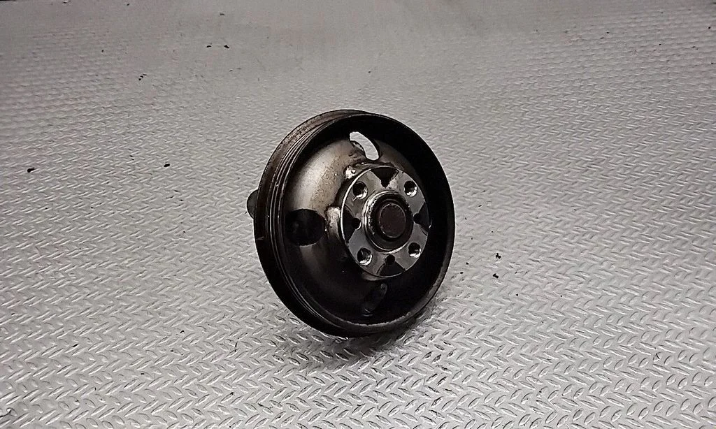 Alternator belt tensioner pulley 31258133