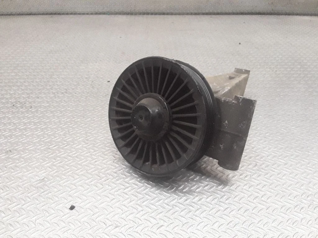 Alternator belt tensioner pulley