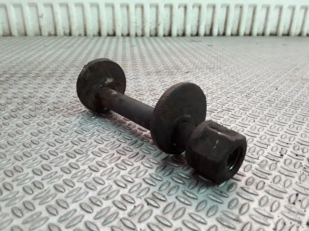 Front suspension camber bolt