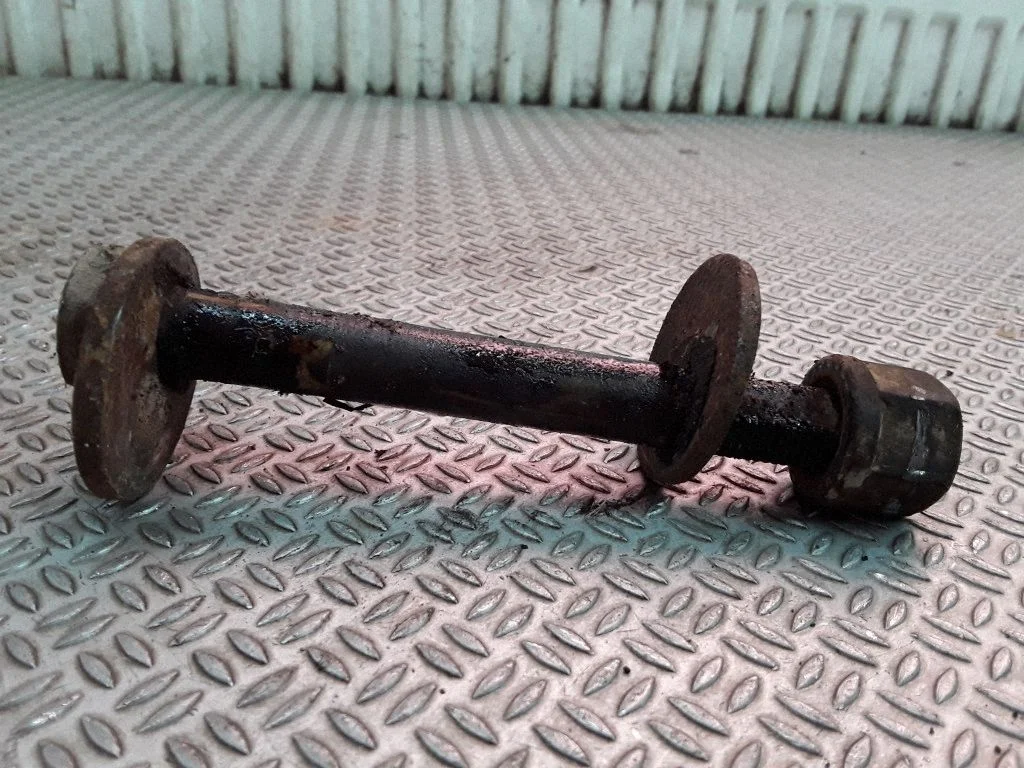 Front suspension camber bolt